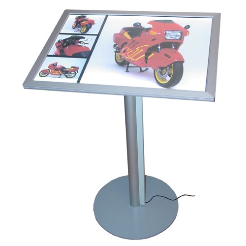 Lit snap frame on showroom stand